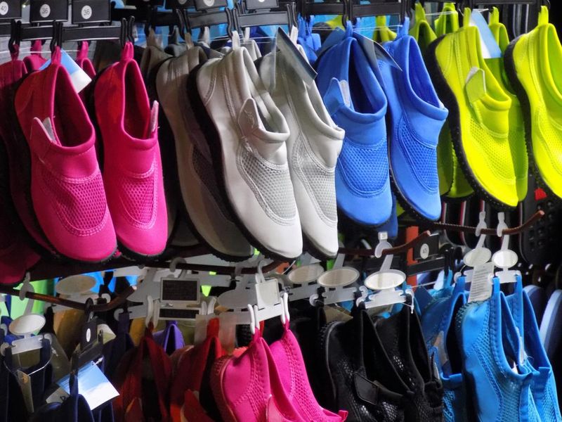 Colorful water shoes in the shoe shop