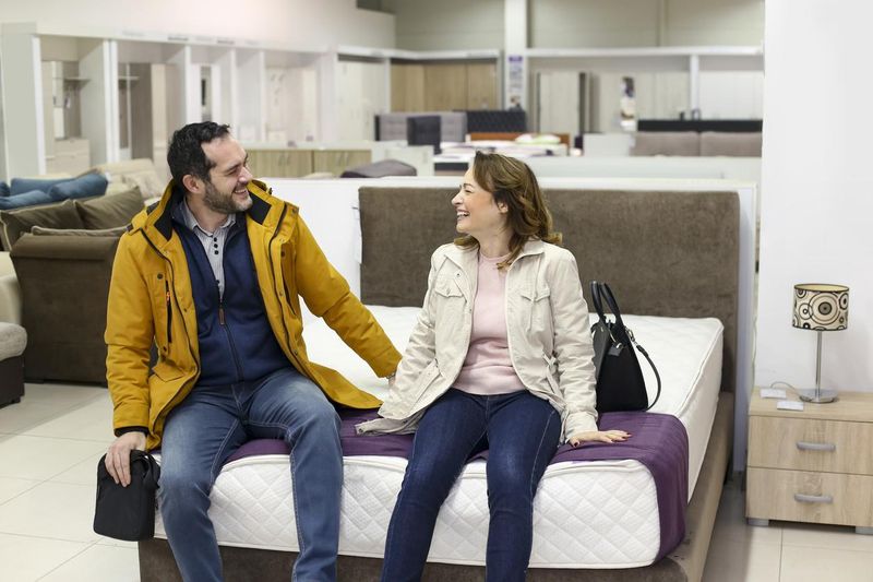 Couple buying a bed