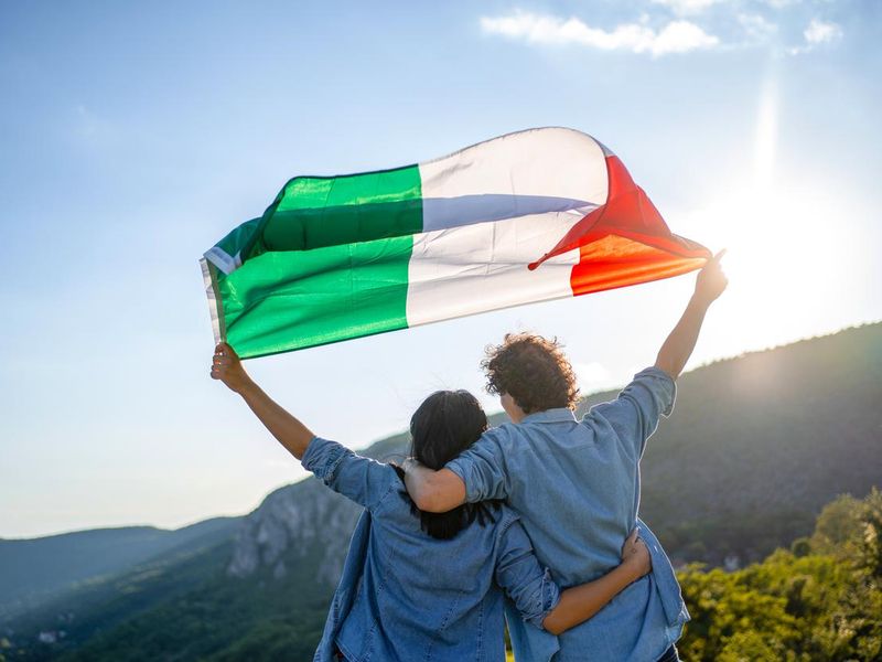 couple holding Italian national flag