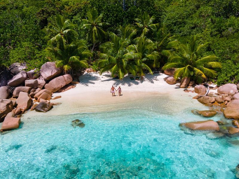 couple in Anse Source d'Argent beach Seychelles