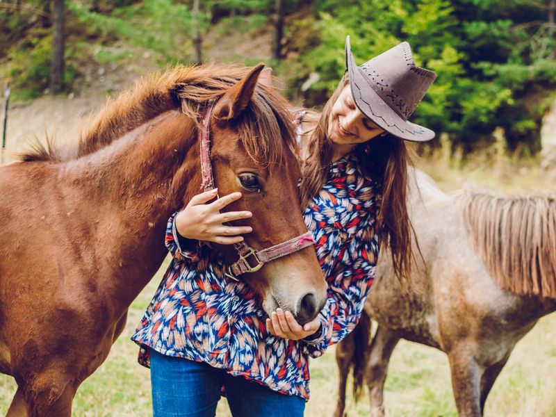 Cowgirl with foals