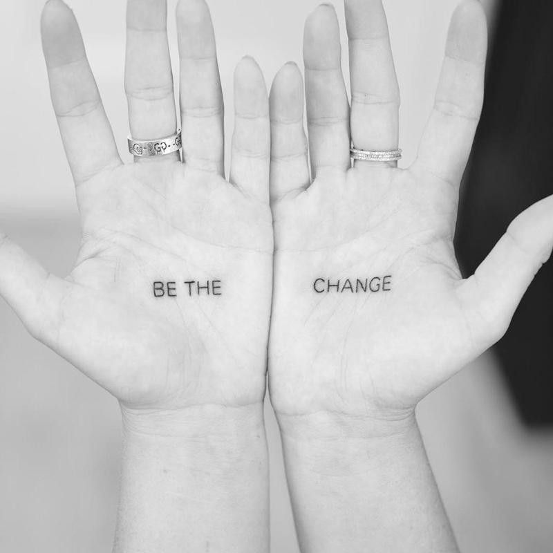 Creative "Be the Change" Palm Tattoo
