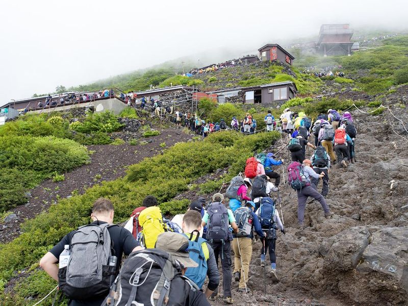 Crowded mountain trail in Mt. Fuji