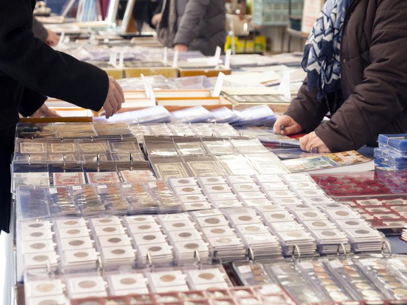 Customers buying old coins