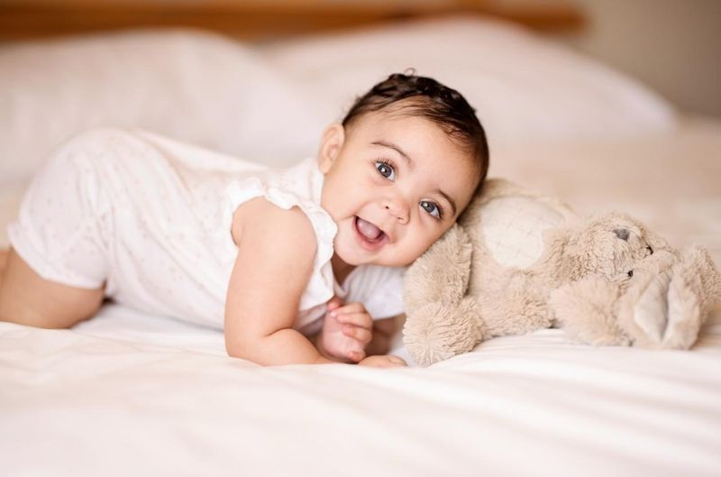 Cute baby girl with teddy bear