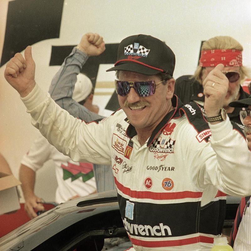 Dale Earnhardt celebrates after winning