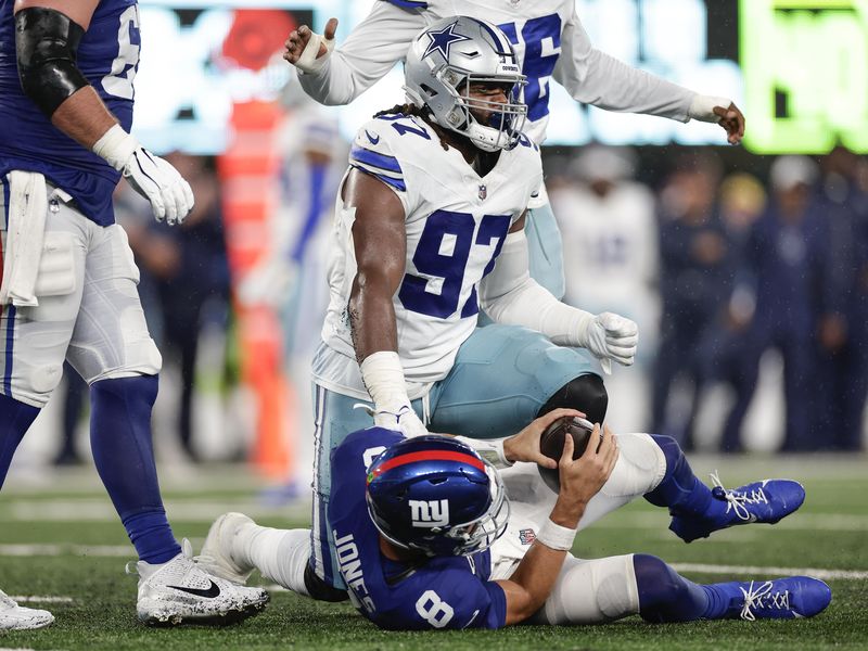 Dallas Cowboys defensive lineman Osa Odighizuwa after sacking New York Giants quarterback Daniel Jones