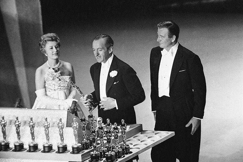 David Niven, Irene Dunn and John Wayne