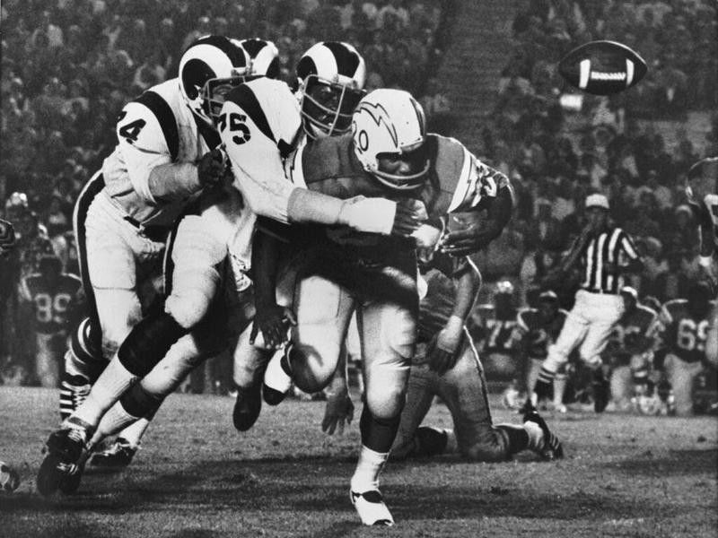 Deacon Jones wrapping up an opponent