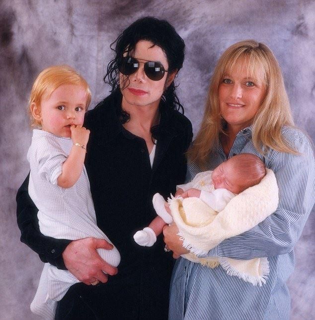 Debbie Rowe with Michael Jackson and their kids