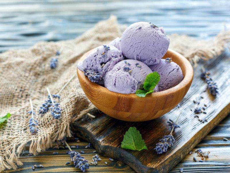 Delicious lavender ice cream in a wooden bowl