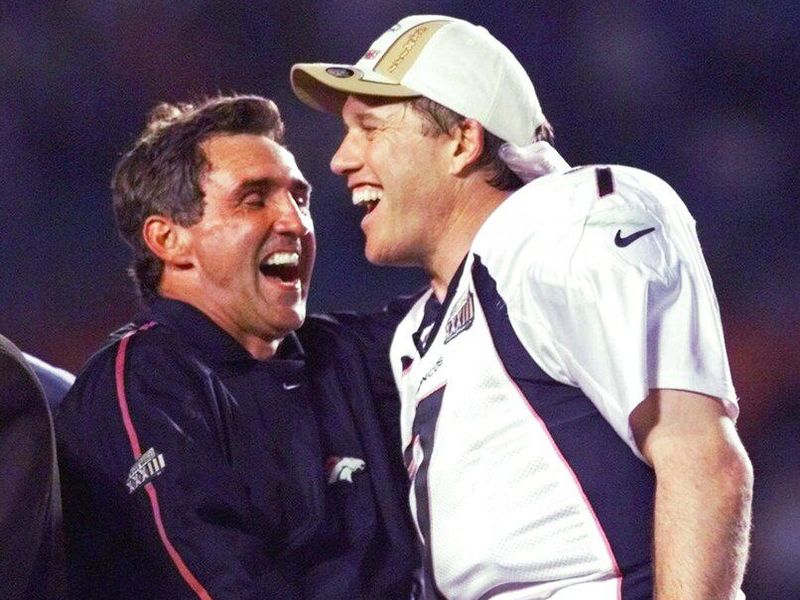 Denver Broncos head coach Mike Shanahan and John Elway