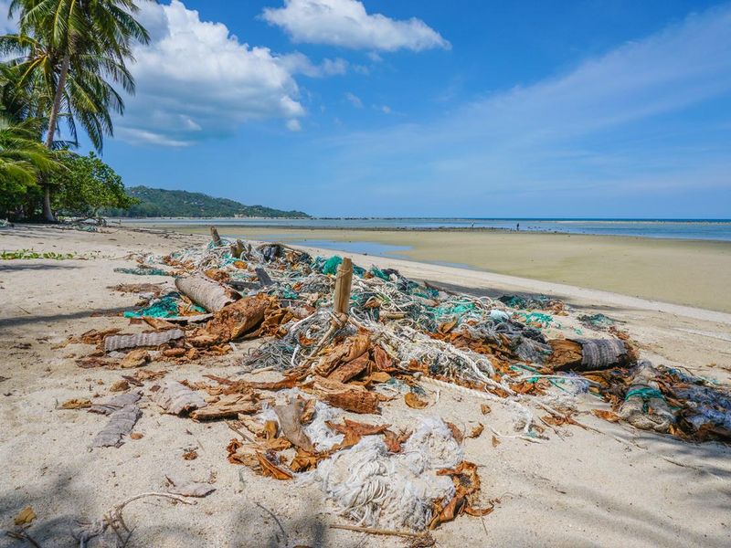 Dirty wastes on the beach, Samui island, Thailand