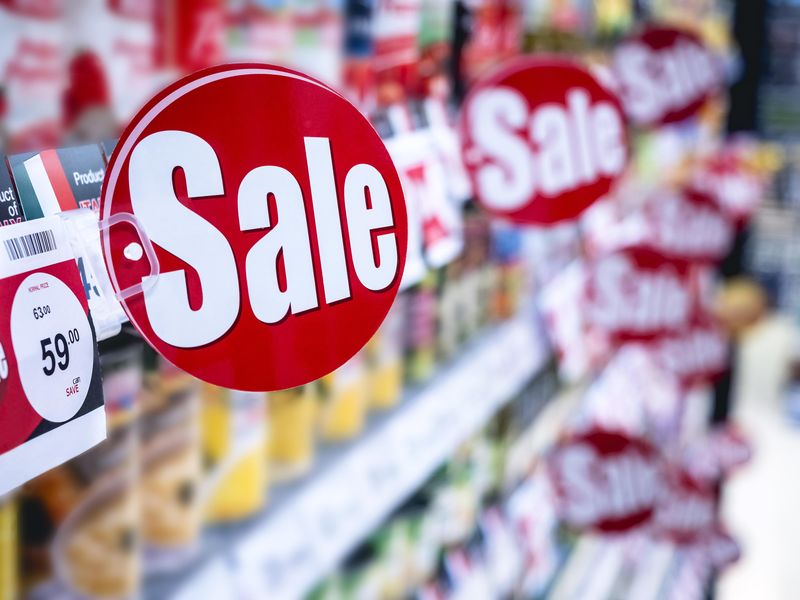 Discount promotion sale sign on supermarket shelves