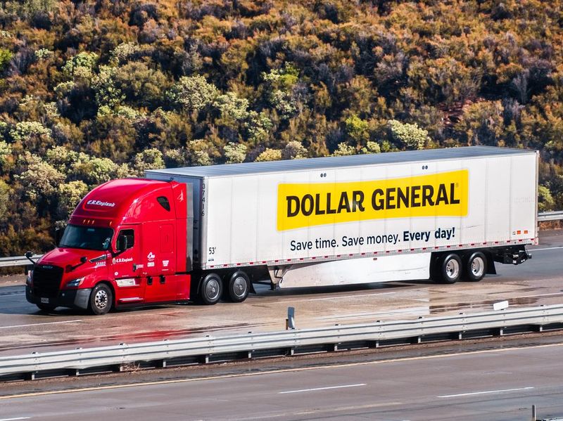 Dollar General truck driving on the freeway