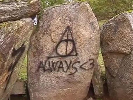 Dolmen tomb defaced with Harry Potter symbols