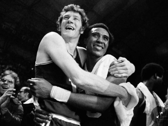 Don Chaney and Jo Jo White embracing