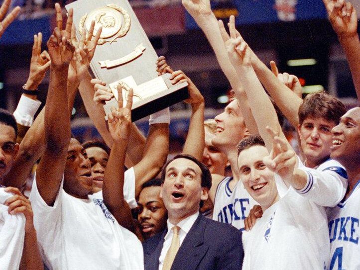 Duke players and coach Mike Krzyzewski celebrate after winning 1992 NCAA title