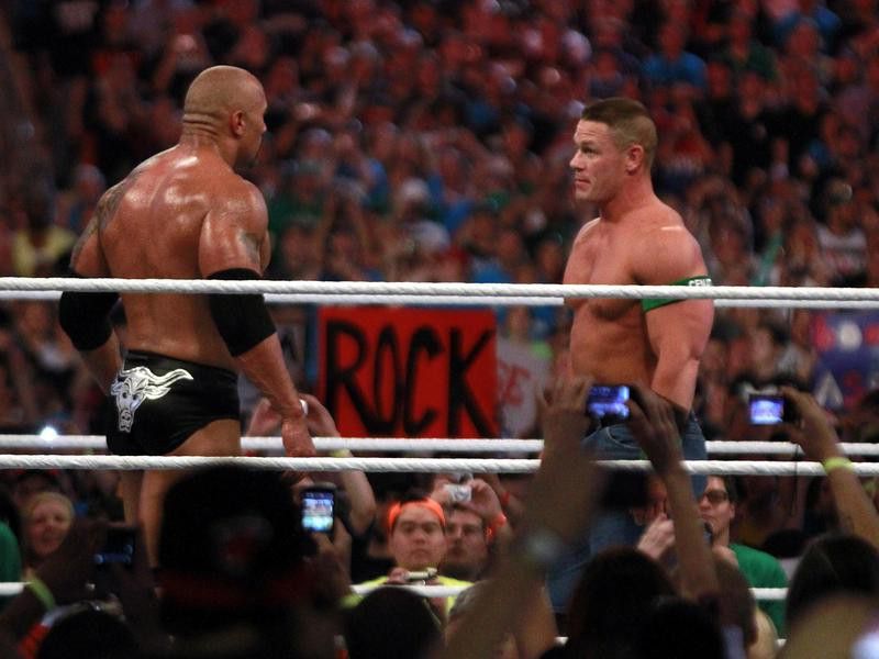 Dwyane 'The Rock' Johnson and John Cena face off at WrestleMania XXVIII