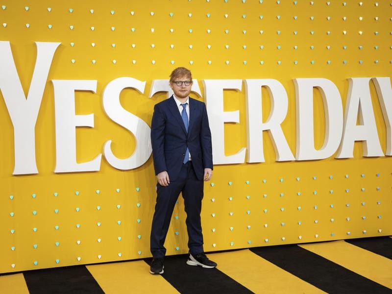 Ed Sheeran poses for photographers at premiere of 'Yesterday'