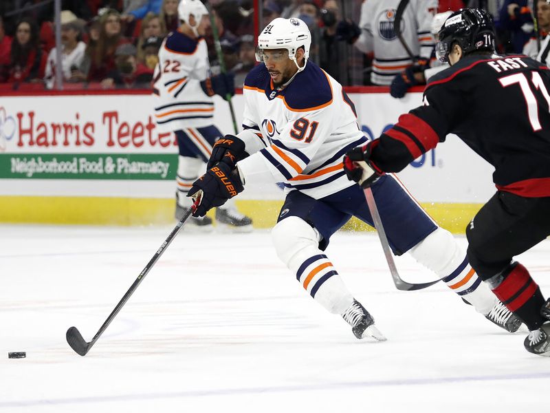 Edmonton Oilers' Evander Kane moves the puck