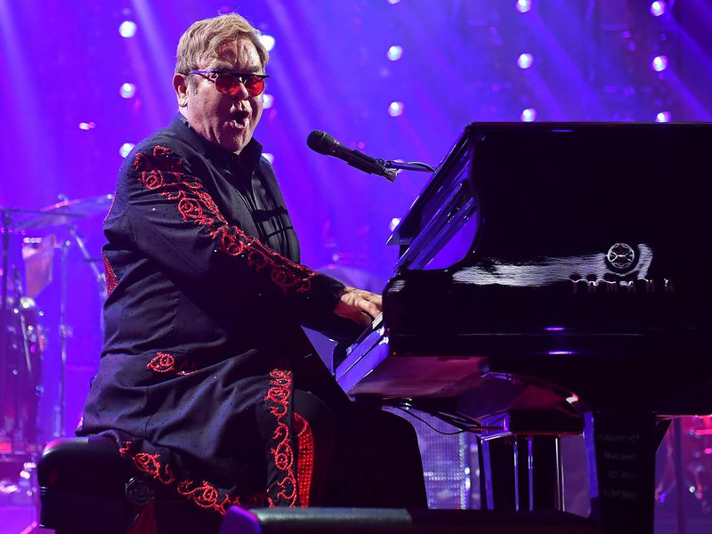 Elton John performing