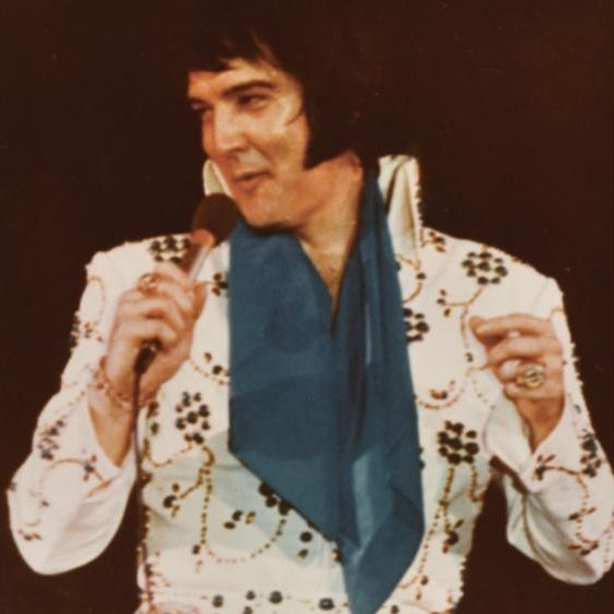 Elvis Presley wearing his 'Aqua Blue Vine' Jumpsuit