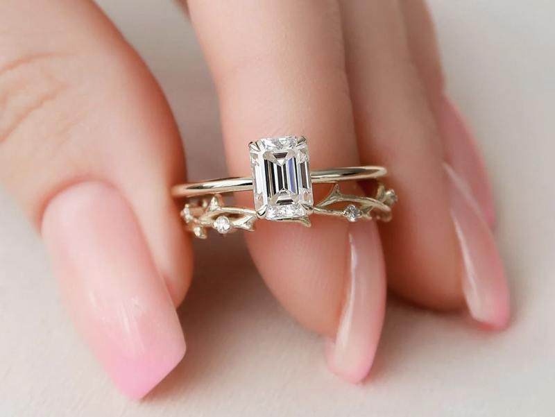 Emerald-cut diamond engagement ring