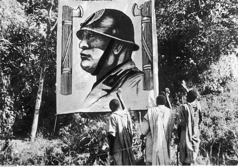 Ethiopians greeting depiction of Mussolini at Mekelle in 1935