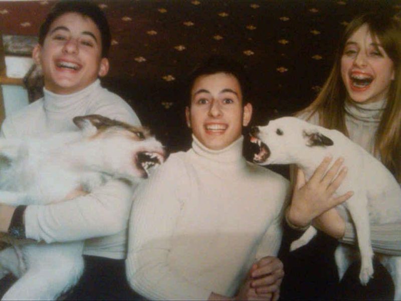 Family photo with fighting dogs
