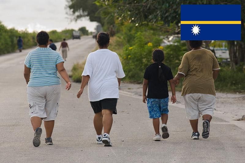 Family walking down the street in Nauru