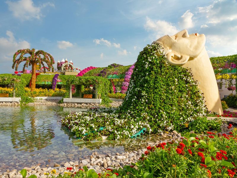 Female head decorated with flowers in Miracle Garden of Dubai.