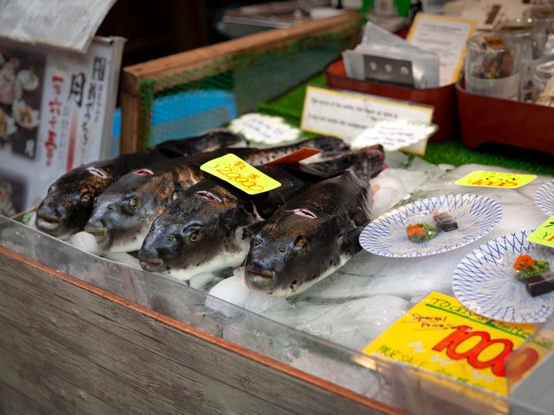 Fresh seafood for sale at Kuromon market in Osaka, Japan
