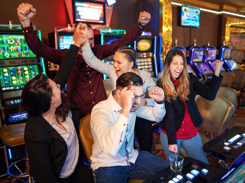 Friends winning while playing on slot machines