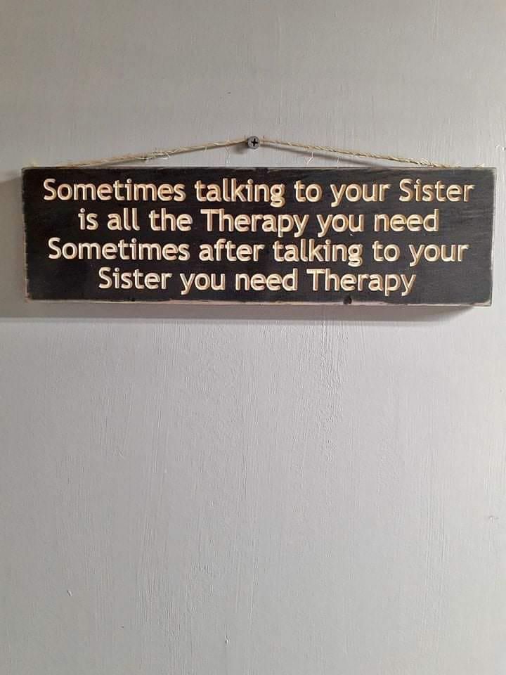 Funny sign about sisters