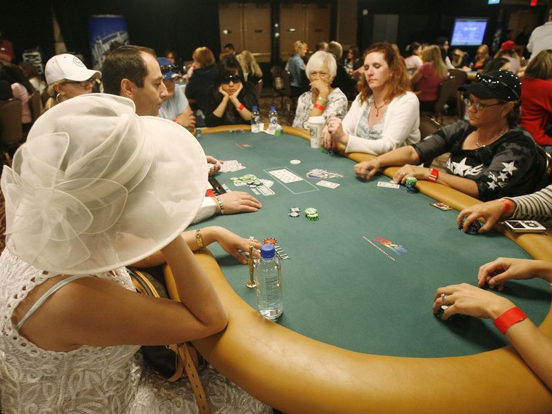 Gamblers in a poker tournament in Las Vegas casino