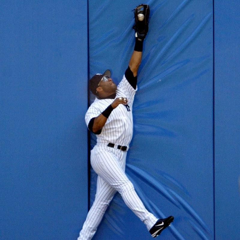 Gary Sheffield leaps to catch a ball