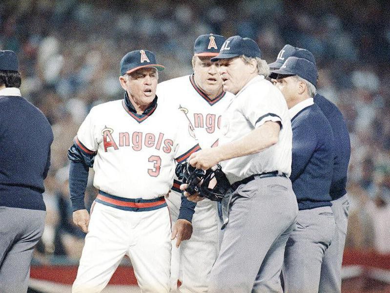 Gene Mauch argues with home plate umpire Terry Cooney