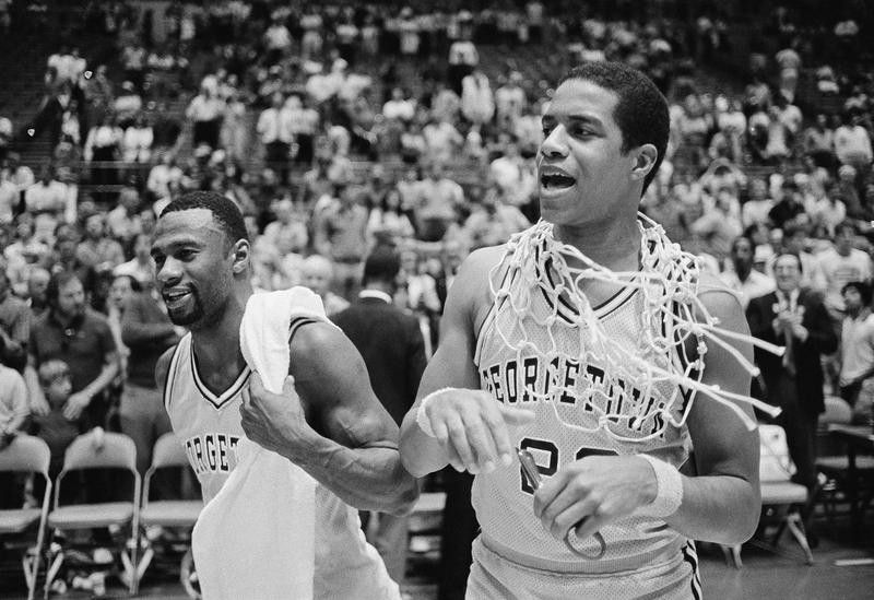 Georgetown's Gene Smith and Fred Brown celebrate after beating Dayton
