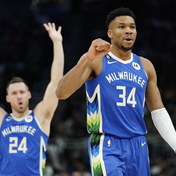 Milwaukee Bucks' Giannis Antetokounmpo (34) and Pat Connaughton (24) celebrate during the second half of the team's NBA basketball game against the Orlando Magic on Wednesday, March 1, 2023, in Milwaukee. (AP Photo/Aaron Gash)