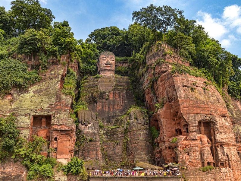 Giant Leshan Stone Buddha carved into cliff face in Leshan, China
