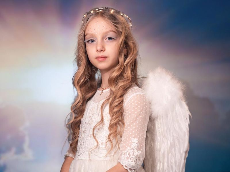 Girl dressed as angel