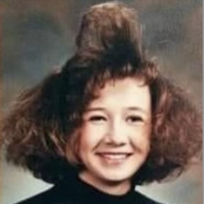Girl with a ridiculous '80s hairstyles
