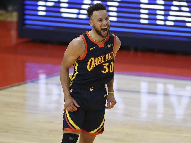 Golden State Warriors guard Stephen Curry yells