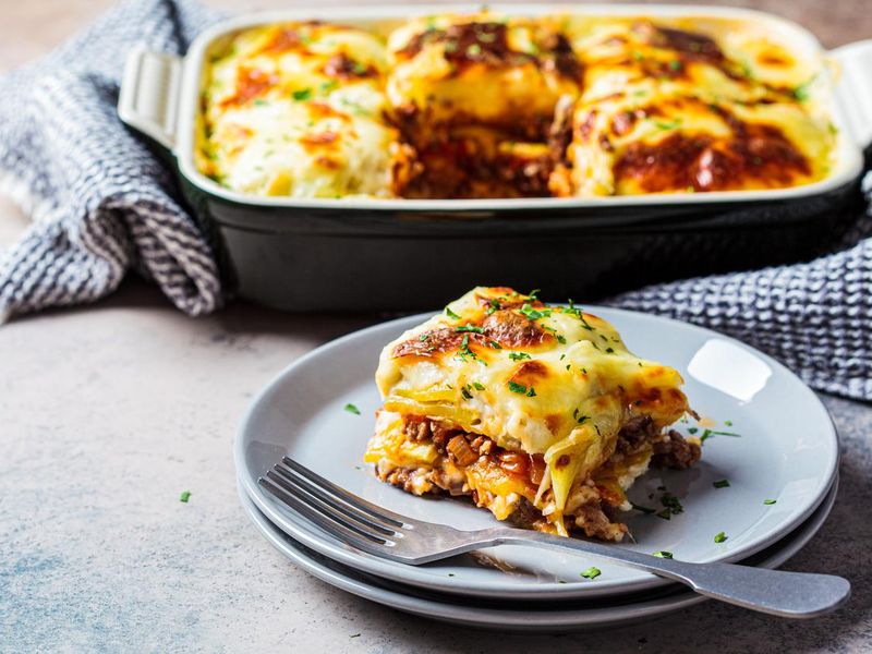 Greek potato and meat casserole with cheese - moussaka