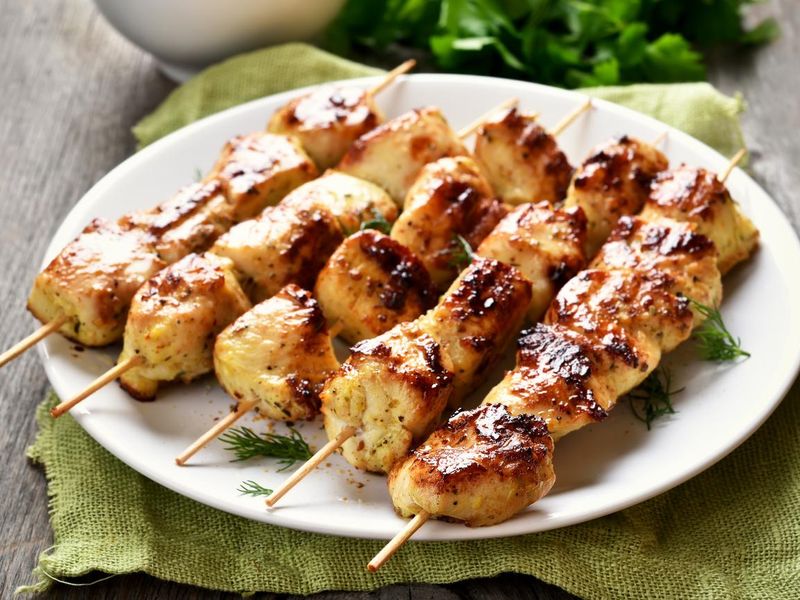 Grilled chicken on bamboo skewers to cure hangovers fast