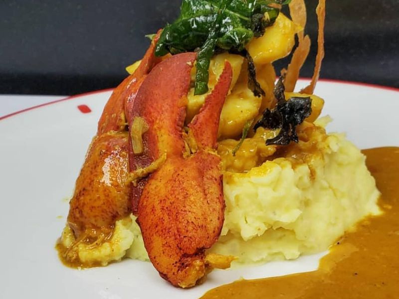Grilled lobster with curry mashed potatoes at Mad Cow Grill