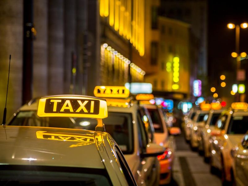 Group of European Taxis at night