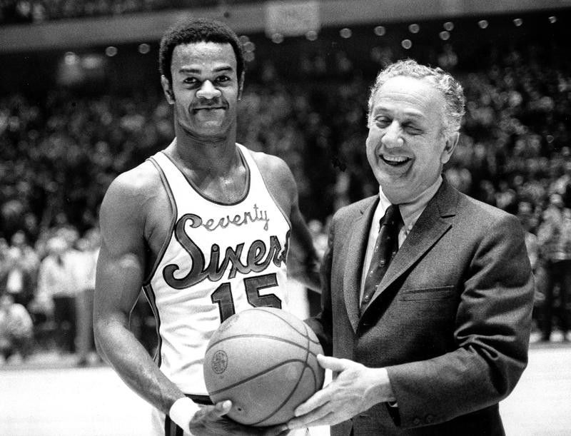 Hal Greer accepts ball from Sixers owner Irv Kosloff