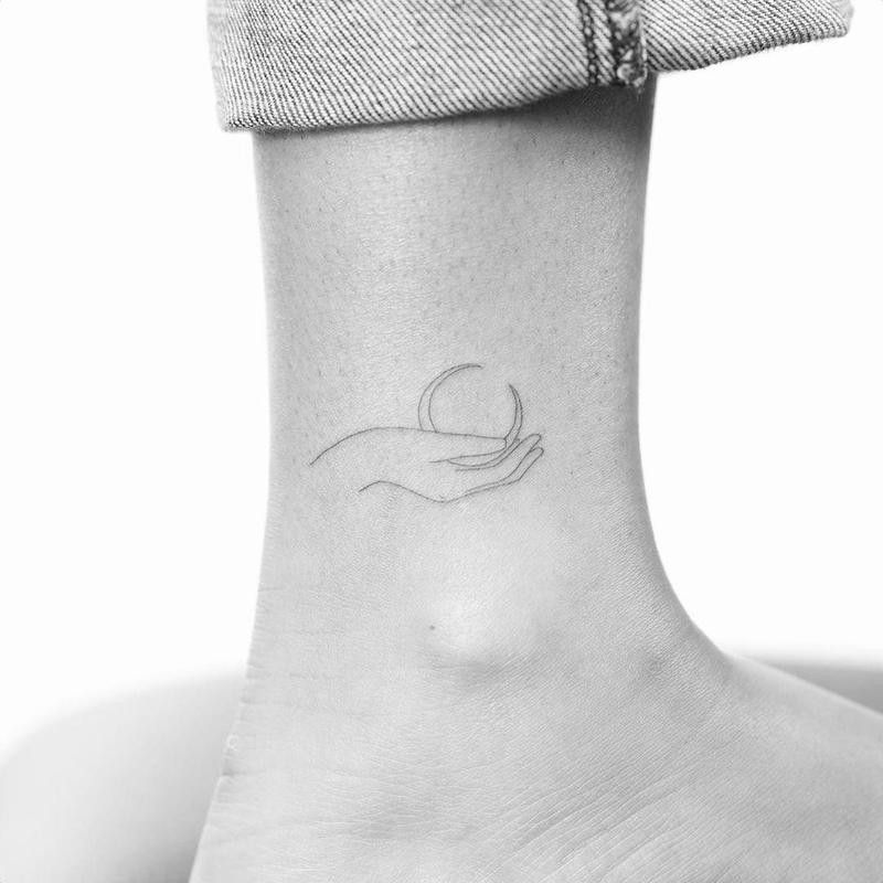 Hand and Crescent Moon Tattoo